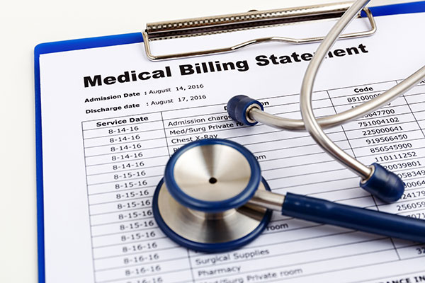 Medical cost concept with stethoscope and medical bill Medical cost concept with stethoscope and medical bill